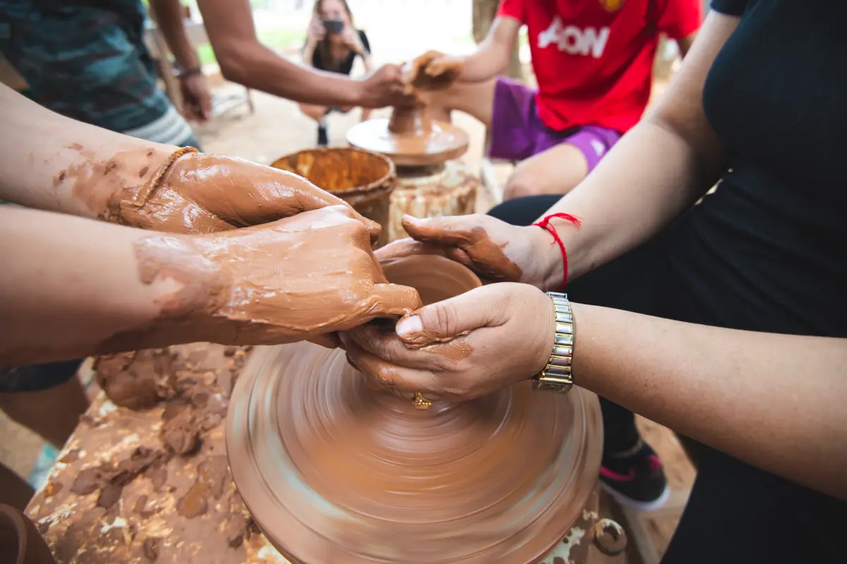 Working with Clay to create beautiful vessels.